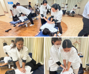 たくさんのセラピストがマッサージの練習をしている