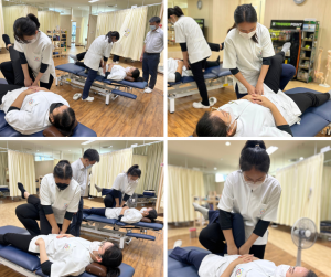 腸腰筋の緊張を緩める手技治療を練習する理学療法科ベーシッククラスのセラピストたち