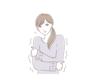 寒そうに震える女性