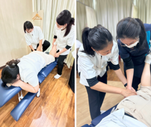 うつ伏せになった人の膝裏をさわっているセラピスト